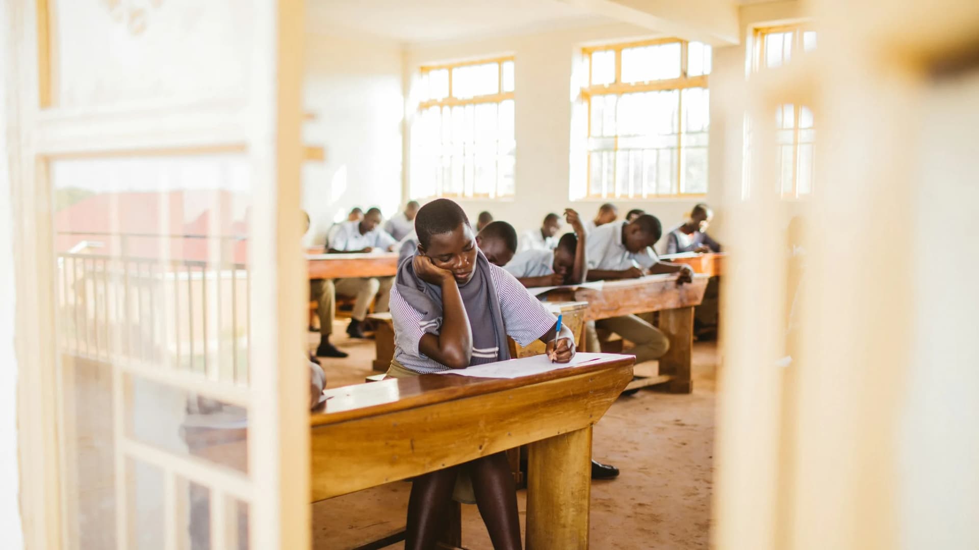 Questions to take into admissions and enrollment Illustrative school scene for Questions to take into admissions and enrollment